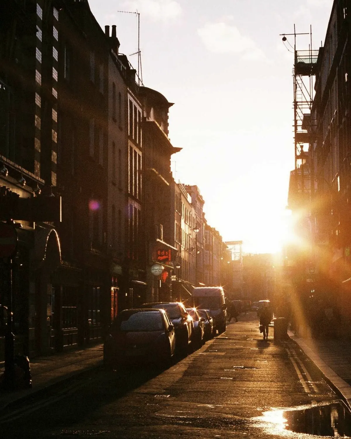 Sunlight at the end of a narrow city street
